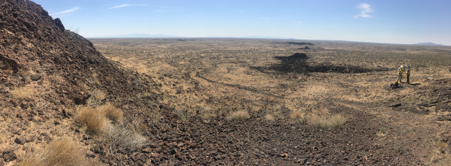 Dr. Brent Garry and Dr. Patrick Whelley setting up a LiDAR scan at Aden Crater