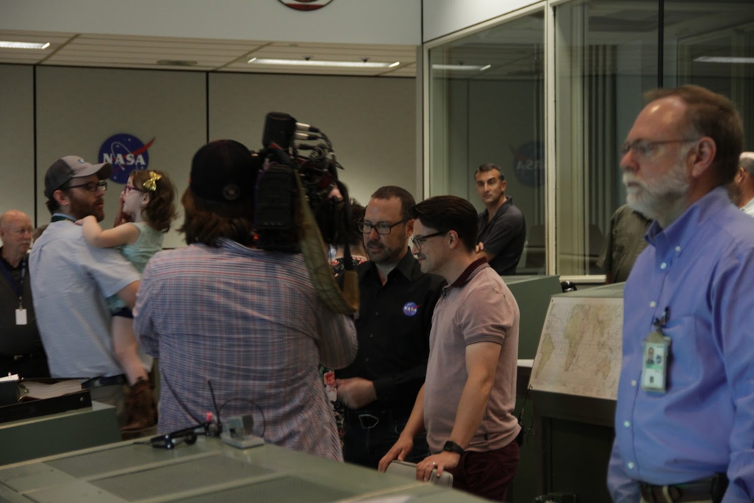 Ben in the Mission Operations Control Room being interviewed by CBC news